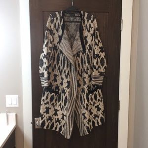 Duster. Great with leggings and boots.